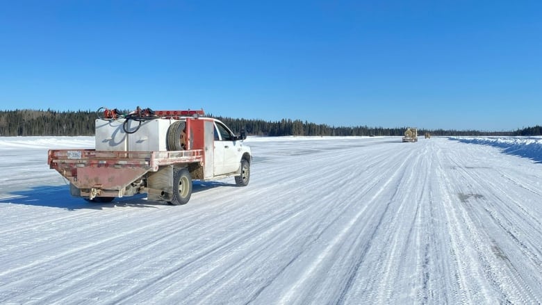 Trucks travel along a winter ice road in Northern Ontario.