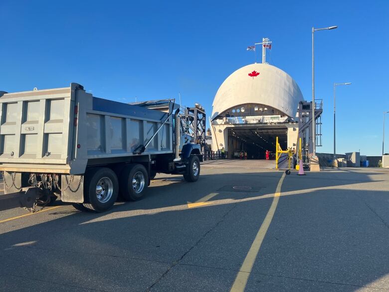 A truck boarding the MV Confederation.