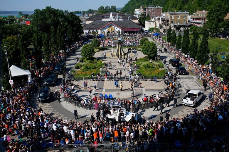 Pope Francis arrives for mass at the National Shrine of Saint Anne de Beaupre, Thursday, July 28, 2022, in Saint Anne de Beaupre, Quebec. Pope Francis is on a 