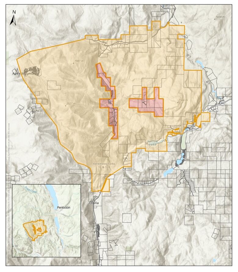 A swath of evacuation alerts cover areas around Penticton, B.C. on a vectorized map.