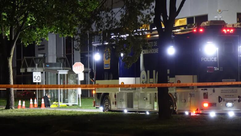 Orange barricade tape sections off Jules-Poitras Boulevard.