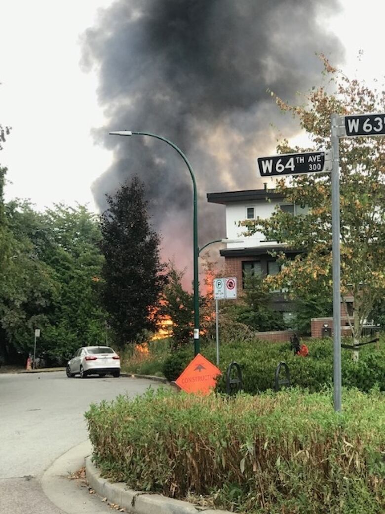 A fire in seen burning near an apartment building on Tuesday around 5 p.m.. It started in a garage on a residential property near 64th Ave and Columbia in south Vancouver. The three-alarm blaze drew dozens of firefighters and forced three buildings' residents to evacuate.