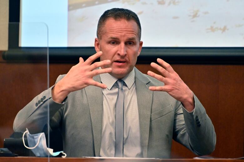 Former Louisville Police Officer Brett Hankison is questioned by the prosecution in Louisville, Ky., on Wednesday, March 2, 2022. 