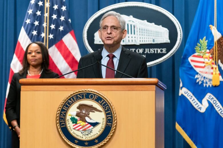 U.S. Attorney General Merrick Garland and Assistant Attorney General Kristen Clarke announce federal charges against four current and former police officers at the Department of Justice in Washington on Thursday, Aug. 4, 2022.