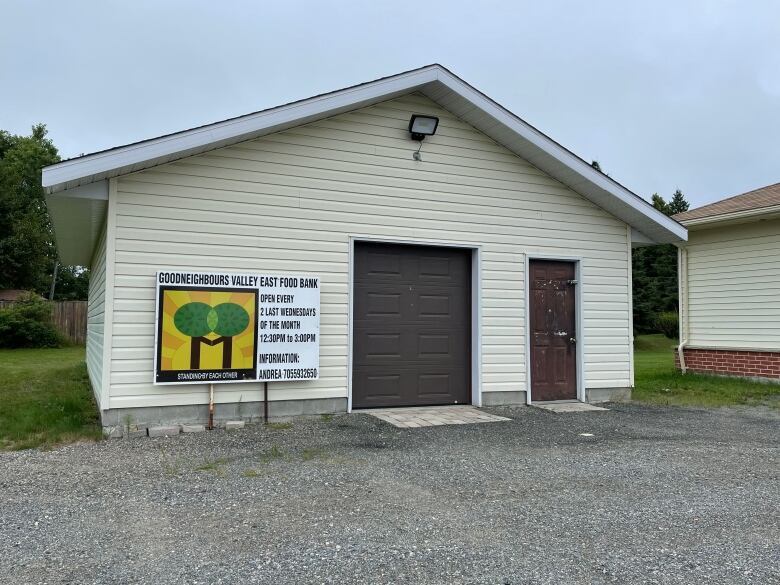 A small building that functions as a local food bank.