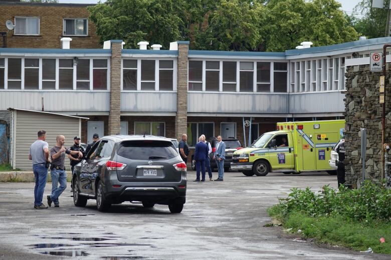 An ambulance outside a motel.