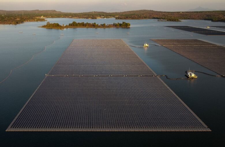 Floating solar panels in a lake.