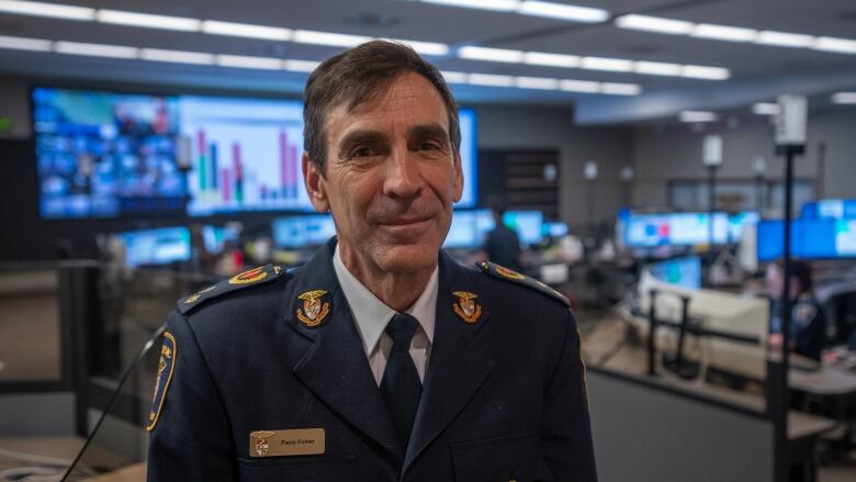 Ottawa Paramedic Service Chief Pierre Poirier is shown in the 911 communications centre.