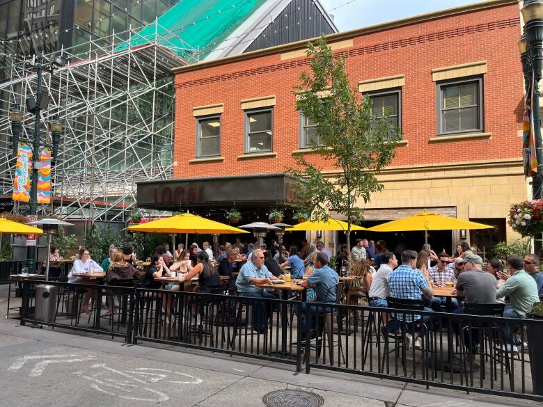 People sitting on a patio.