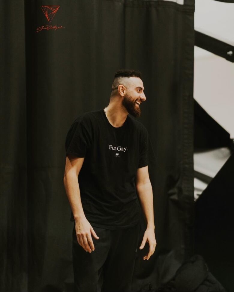 A picture of a young man in black.