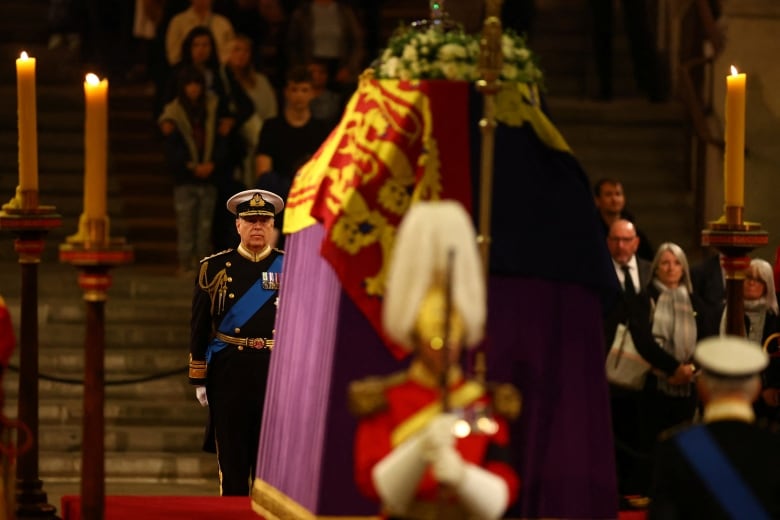 A man in military regalia.