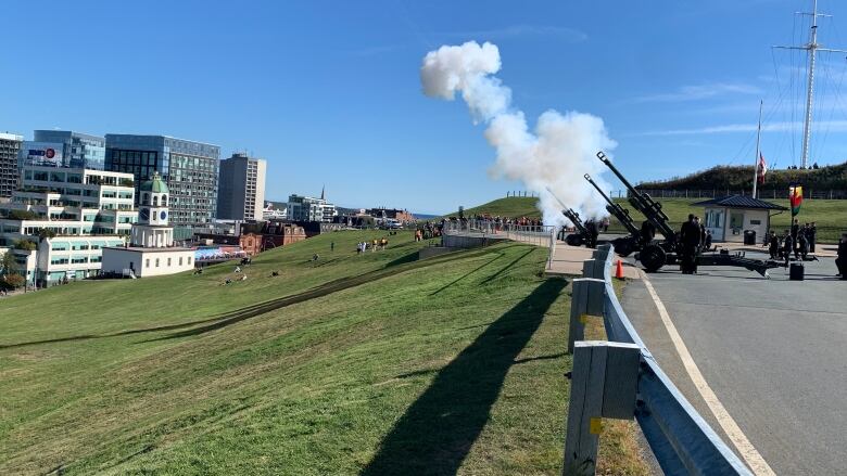 The Royal Canadian Artillery performing a 21-gun salute from Citadel Hill. The clock tower can be seen in the background.