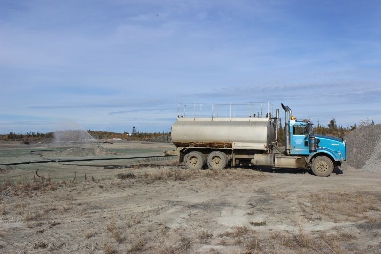 A truck spraying water.