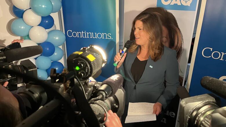 Kateri Champagne Jourdain speaks to reporters following her victory. 