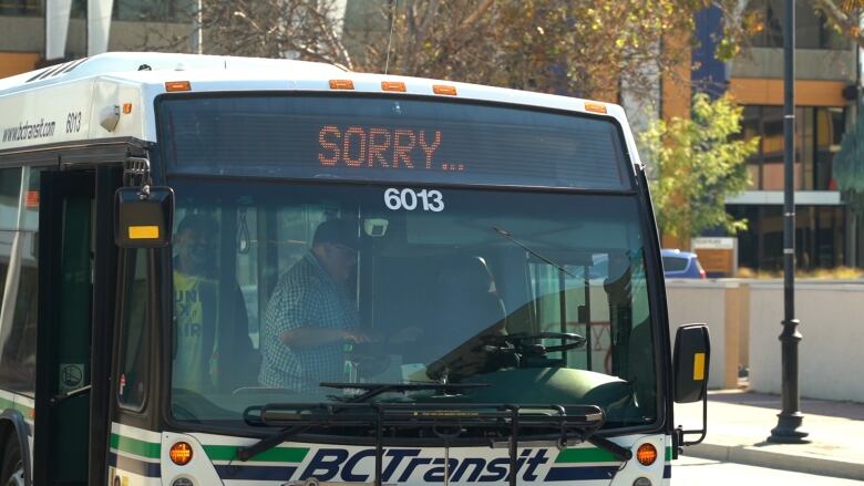 A B.C. Transit bus with the text 'Sorry...' atop it.