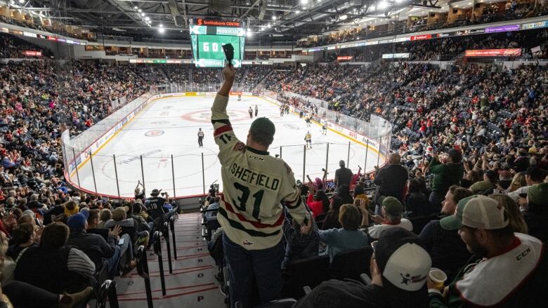 A Halifax Mooseheads fan celebrates a goal during the Oct. 1, 2022, game between the Mooseheads and the Cape Breton Eagles at the Scotiabank Centre in Halifax.