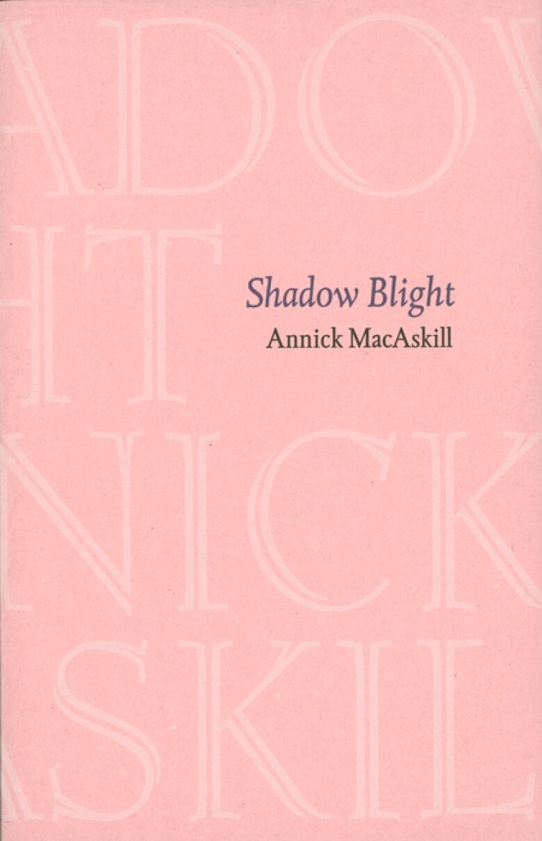 The pink book cover feature huge block letters across the cover. The block letters are a fragment of the book title and author's name.