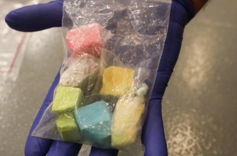 Rainbow fentanyl shown in a plastic bag. 