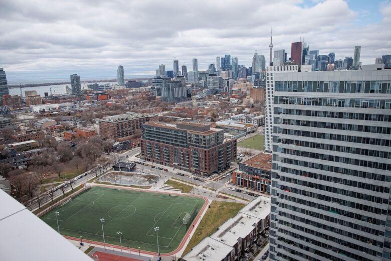 A sports field amidst subsidized housing towers in Torontos Regent Park neighbourhood is pictured from a rooftop on Apr. 14, 2022. The Toronto Community Housing Corp. is working to complete the final two phases of a decades-long revitalization project in the area.