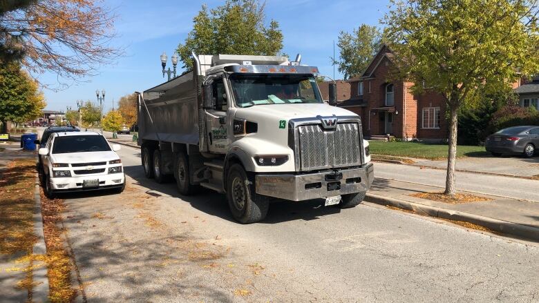 A gravel truck on Greenpark Boulevard.