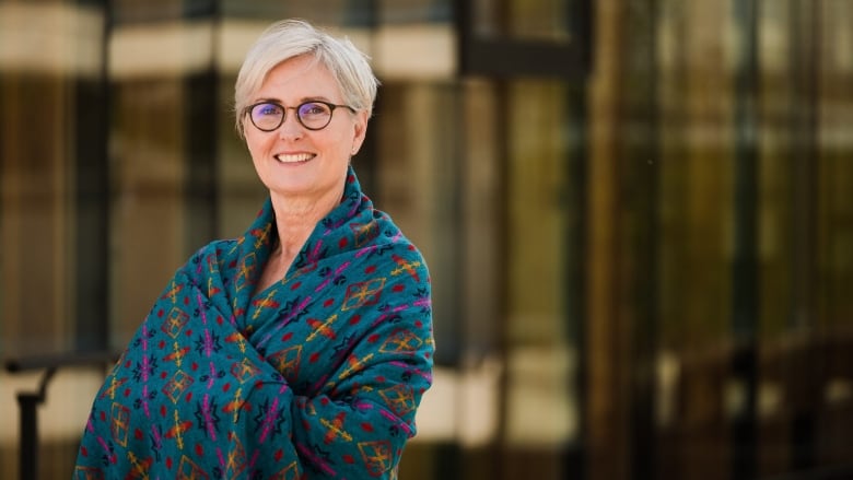 Mary Ellen Turpel-Lafond stands smiling.