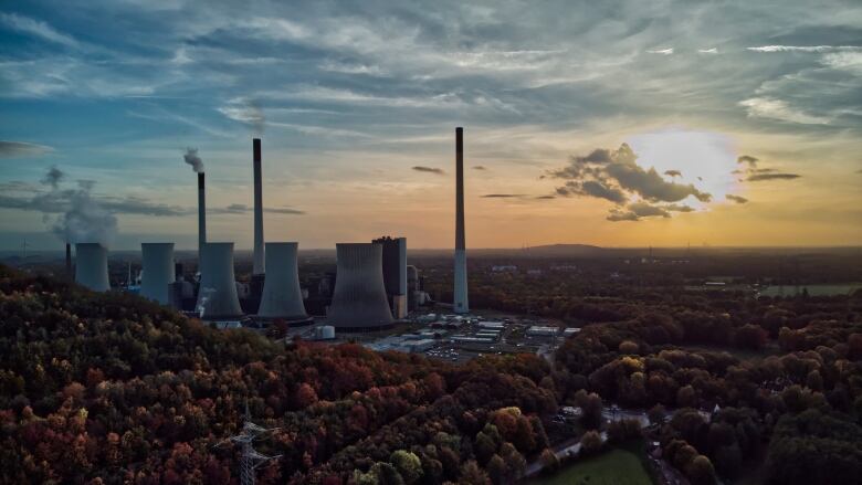 Sun sets behind a coal-fired power plant in Germany. 