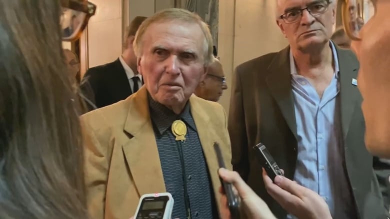 Colin Thatcher, former MLA of Saskatchewan and convicted murderer, speaks with media after the speech from the throne at the Saskatchewan Legislature in Regina, on Wednesday, October 26, 2022. 