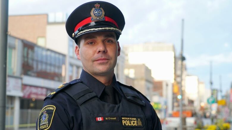 A close up portrait of a police officer.