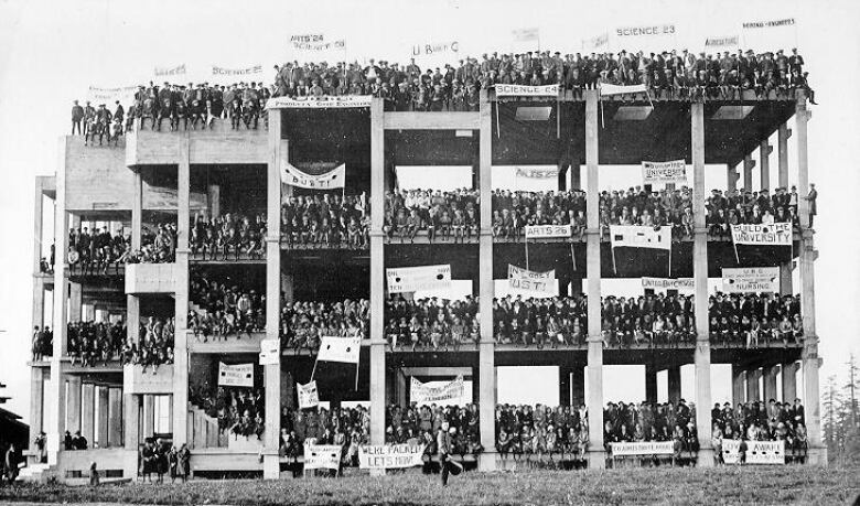 Students protesting the delay to finishing UBC's Point Grey campus sit in a half-built science building following a protest march from downtown Vancouver on Oct. 28, 1922.