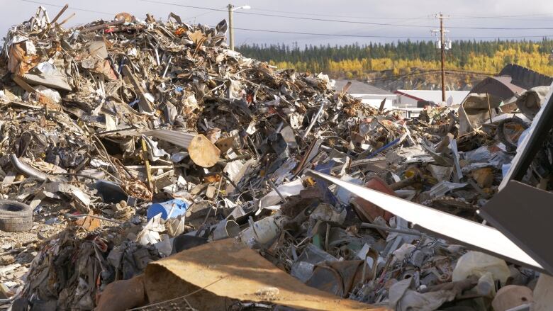 A variety of waste materials strewn in piles.