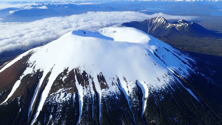 A snow-capped volcano.