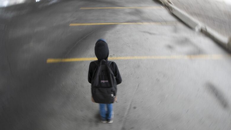 A child is walking.