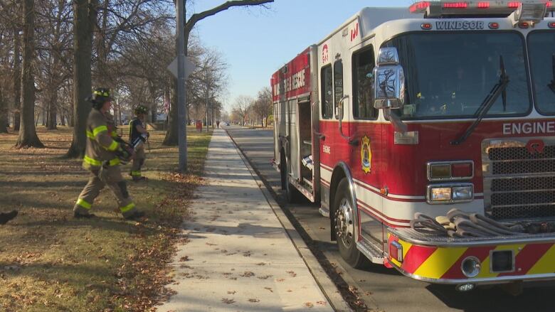 Firefighters had to return to Memorial Park twice Thursday to put out smouldering logs from a fire Wednesday night.