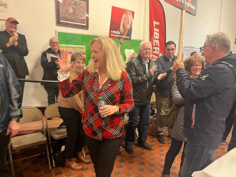 Liberal Leader Sharon Cameron waves at members of her party during the leadership convention in November, 2022.