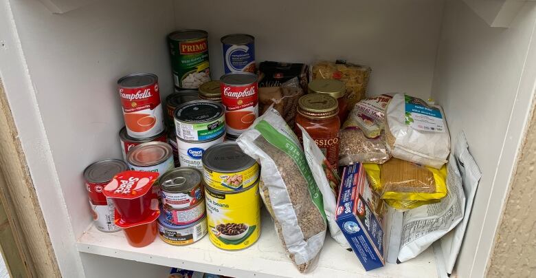 Food on a shelf in a pantry 