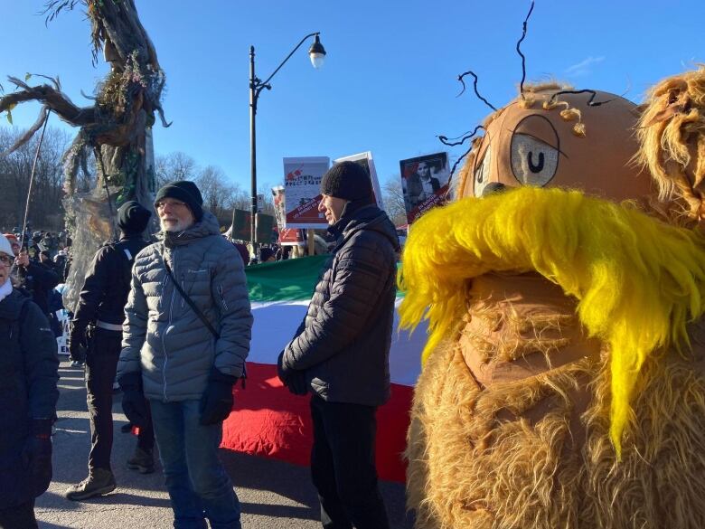 A mascot of Dr. Seuss' The Lorax could be seen among protesters