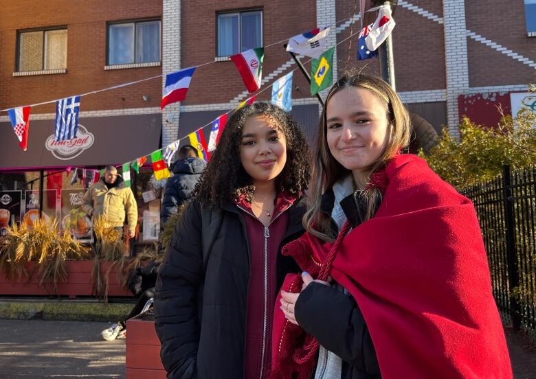 Leila Elmasri and Yasmine Lahlou searched for a place to watch the Morocco-France World Cup game on Jean-Talon Boulevard in Montreal.