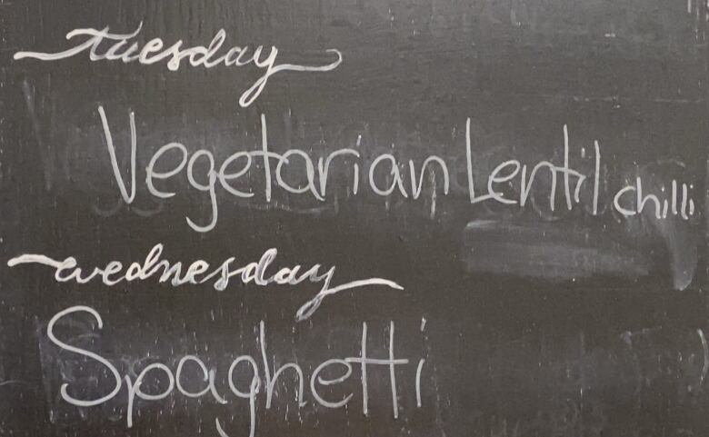 A blackboard with food menu 