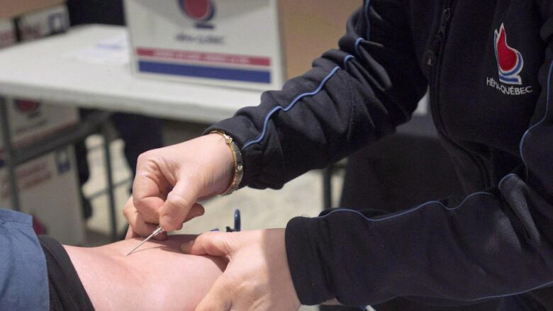 A patient donates blood.