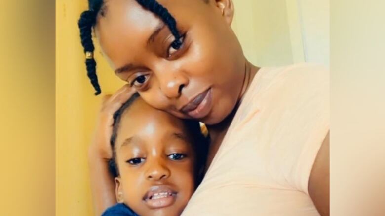 Fatumah Najjuma, 29, is pictured here with her three-year-old daughter, Ilham. Najjuma is facing deportation to Uganda, the country from which she says she ran for her life, because of her religious and social affiliations.