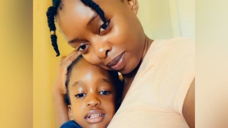 Fatumah Najjuma, 29, is pictured here with her three-year-old daughter, Ilham. Najjuma is facing deportation to Uganda, the country from which she says she ran for her life, because of her religious and social affiliations.