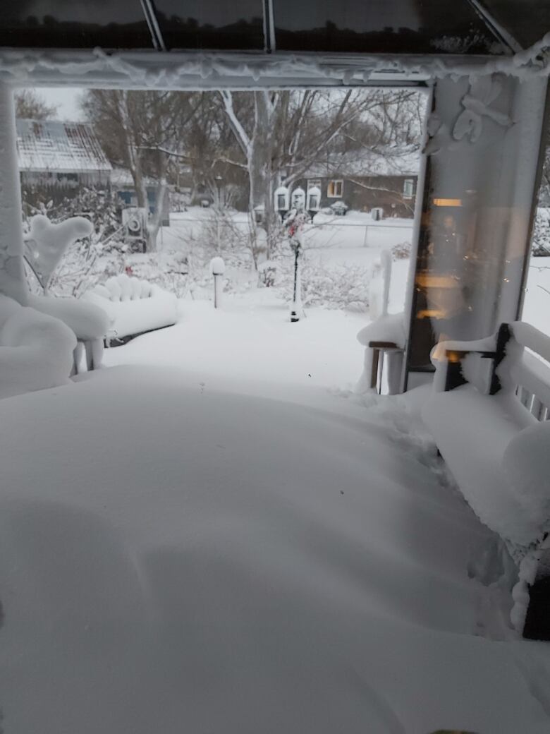 Deep snow covers patio furniture