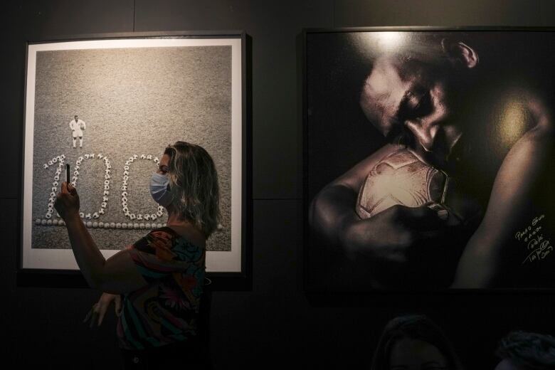 A visitor stands outside the Pele Museum in Santos, Brazil.