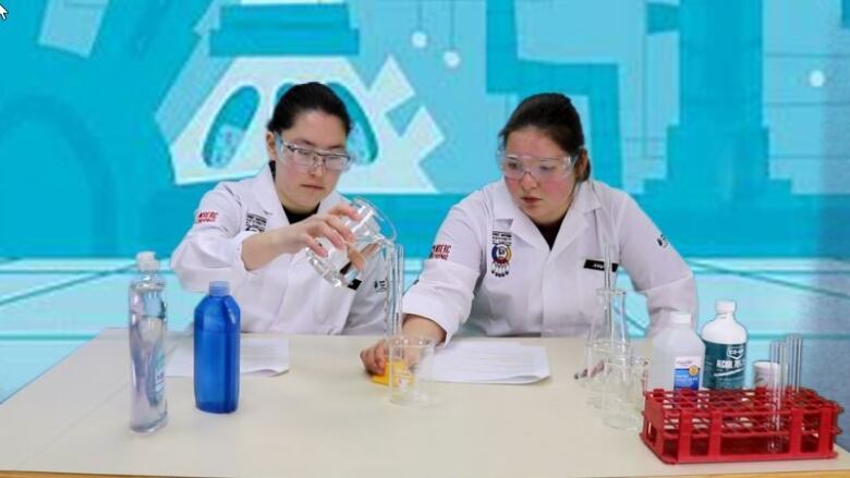 Students at Carlton Comprehensive High School in Prince Albert, Sask., perform a lab experiments as part of the National Science Laboratory Video Lessons for Indigenous Youth. 