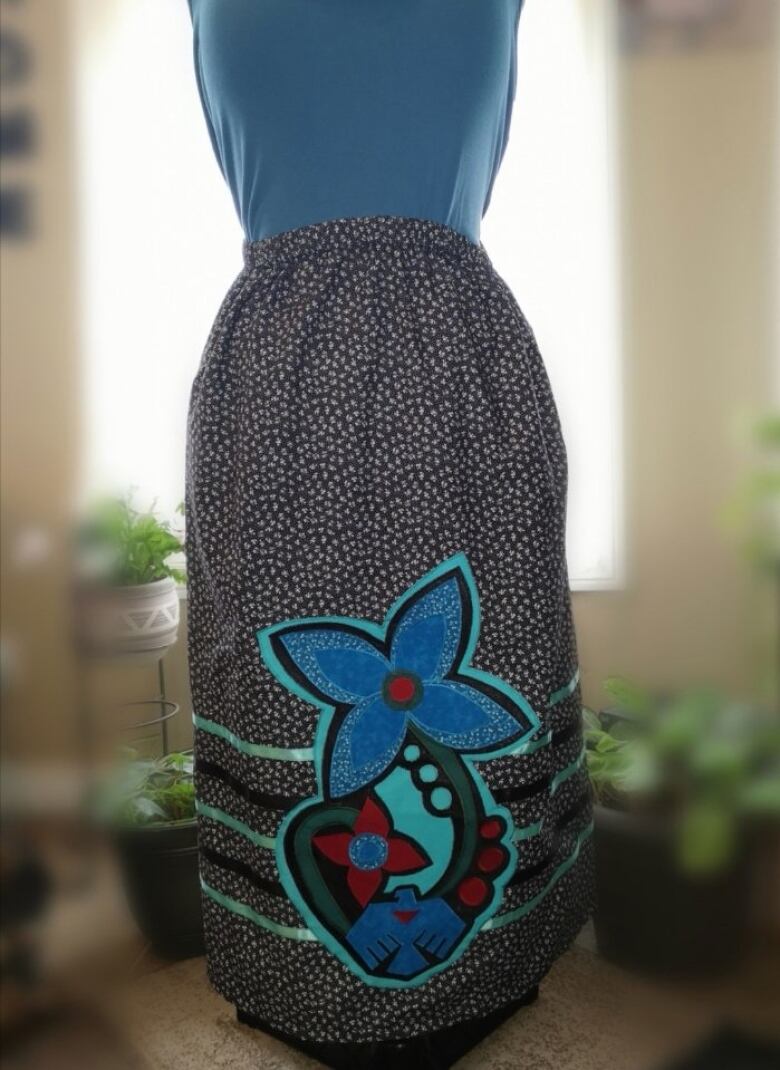 One of Felicia Huff's ribbon skirt designs. She custom makes the skirts based on the event, colours and preferences of the wearer. 