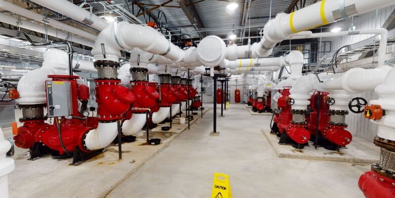 Image shows expensive, pristine production equipment inside the $90-million dollar marijuana facility in St. John's.