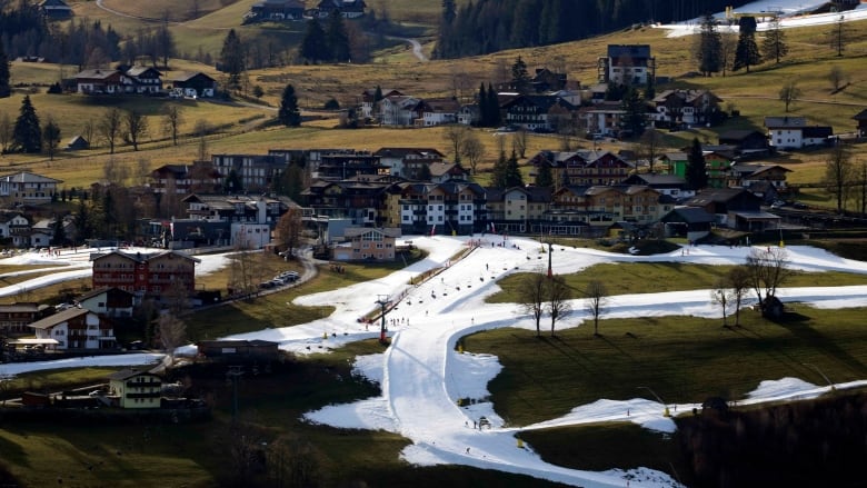 A ski slope has hardly any snow amid winter due to unseasonably warm weather in Europe.