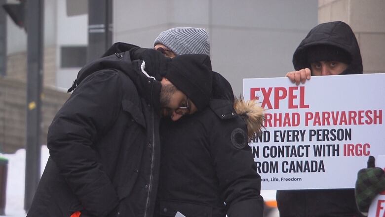 A photo of Mohammad Aminni outside a demonstration at ICAO.