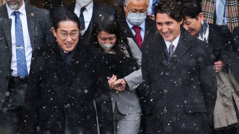 Prime Minister of Japan Kishida Fumio and Prime Minister Justin Trudeau leave Parliament Hill following meetings in Ottawa on Thursday, Jan. 12, 2023.