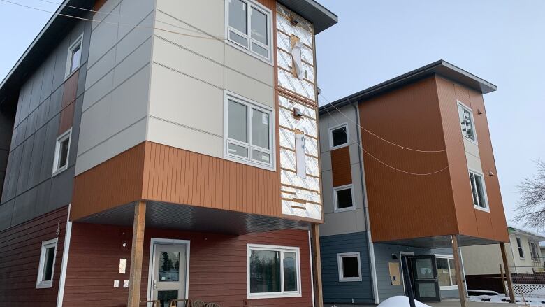 Two three-storey residential buildings.